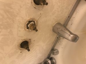 Rusted shower before its repaired by a victorville plumber